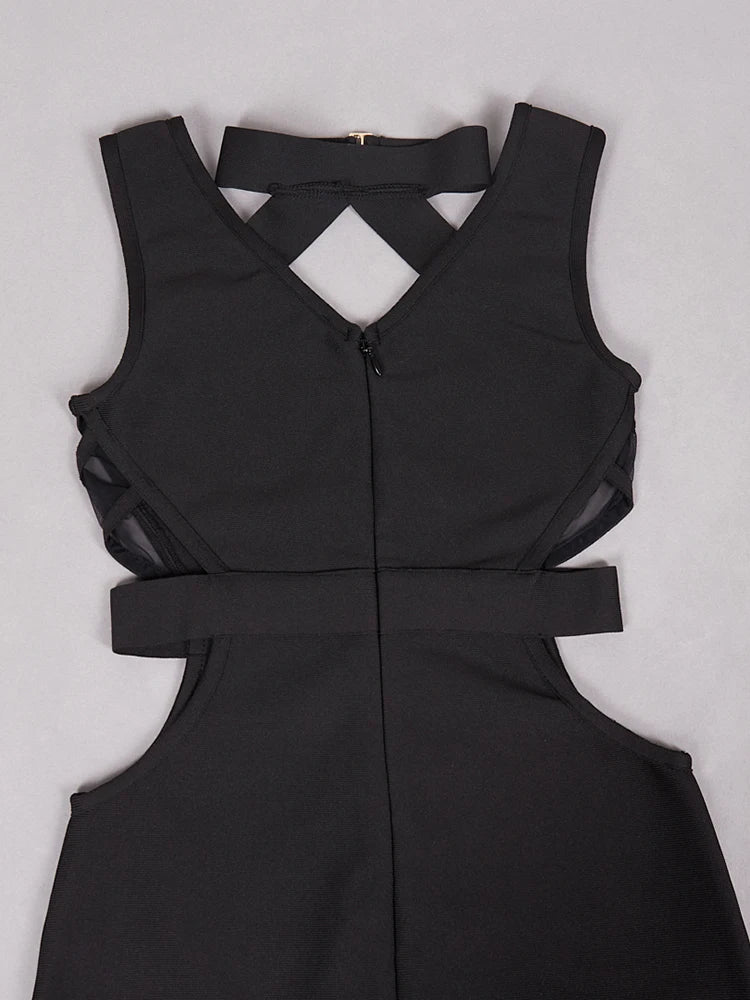 Black sleeveless dress with cut-out design on a light gray background