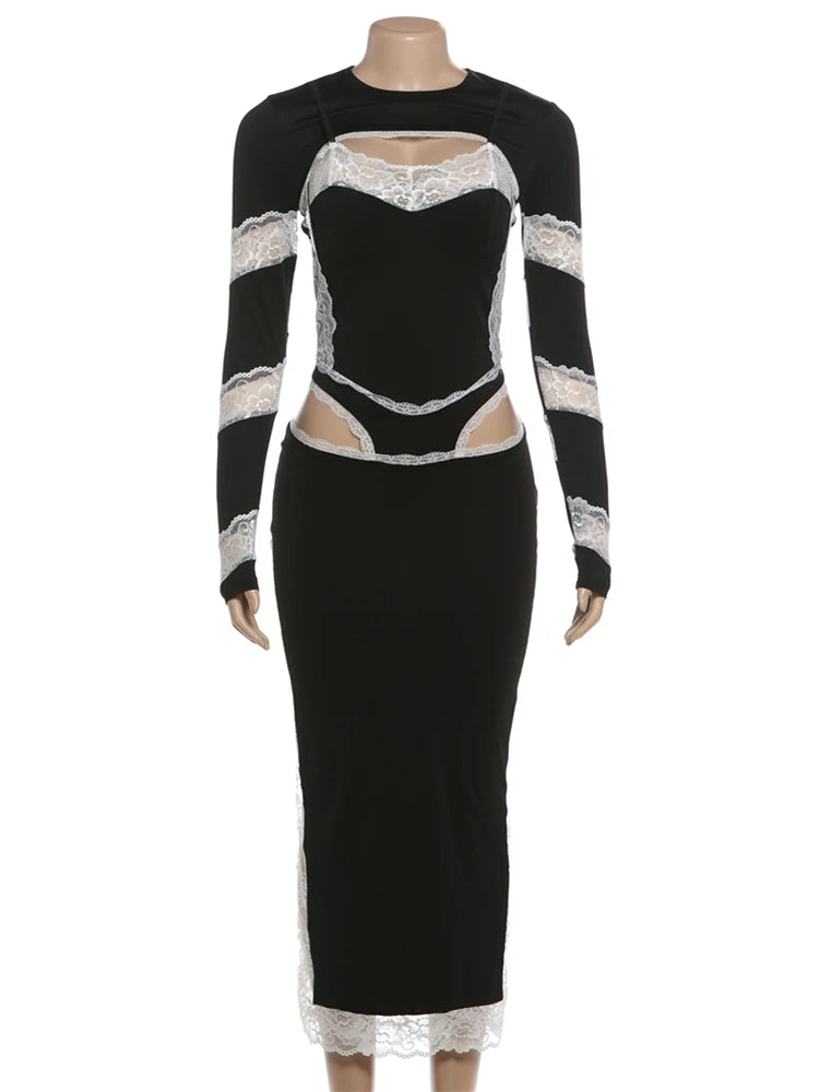 Black dress with white lace details on a mannequin against a white background