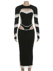 Black dress with white lace details on a mannequin against a white background
