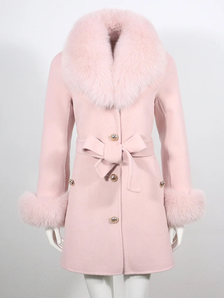 Pink coat with fur collar and cuffs on a white background