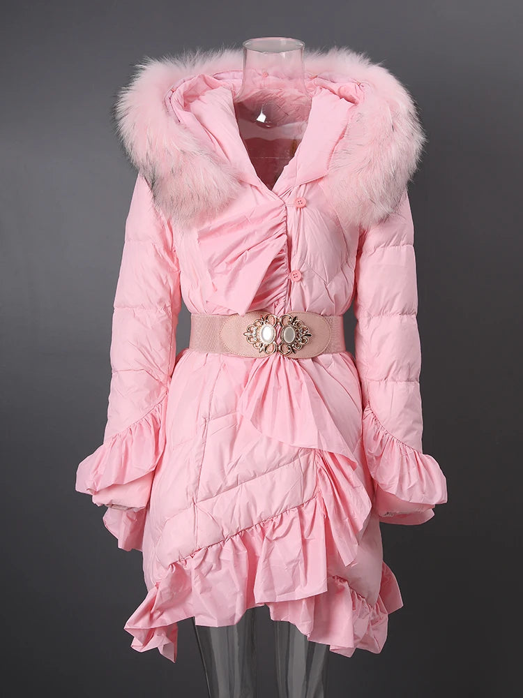 Pink puffer coat with fur hood on a gray background