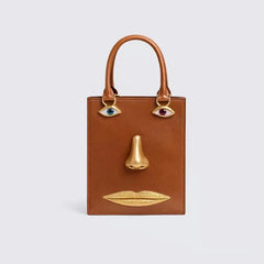 Sculptural Face Embellished Bag