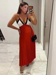 Colorblock chain strap maxi dress with pleated skirt