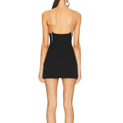 Black dress with thin straps on a white background