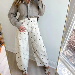 Cream wide leg jeans with brown polka dots