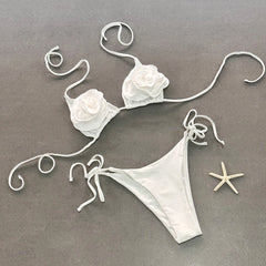 White embellished bikini set laid flat