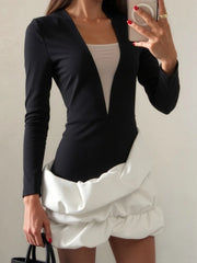 Monochrome mini dress with slim top and voluminous hem