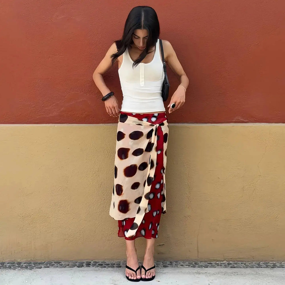 Woman wearing a printed wrap midi skirt