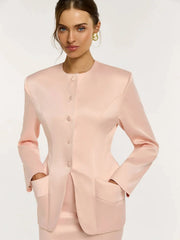 Pink satin hourglass waist blazer on mannequin