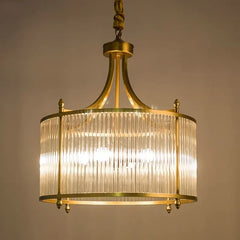  Lifestyle image showcasing the modern chandelier as a statement piece in a contemporary dining room. Golden Atelier 4