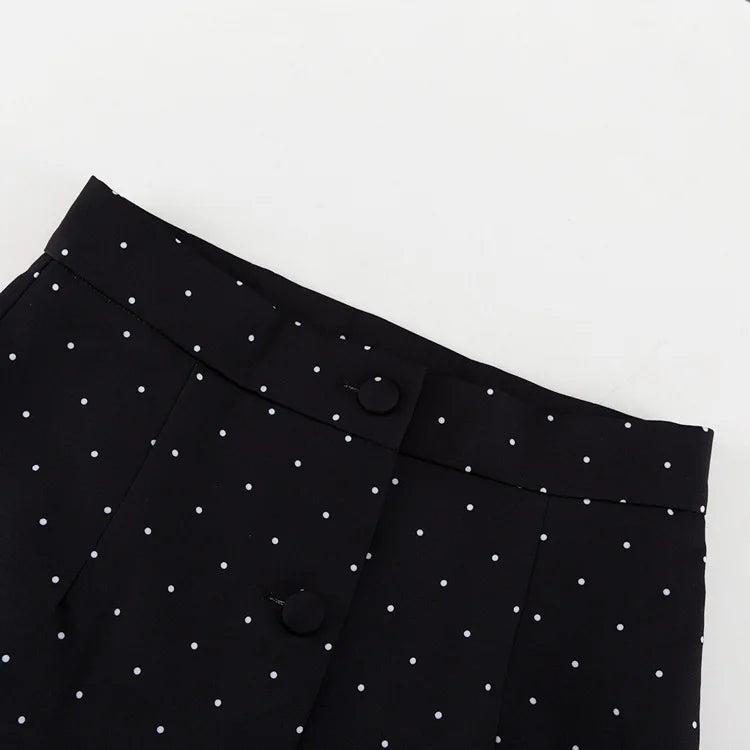Black pants with white polka dots