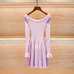 Lavender dress on a wooden hanger against a wooden background