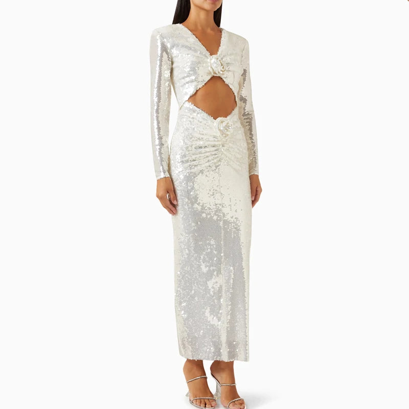 Full-length studio shot of a sequin V-neck cutout midi dress.