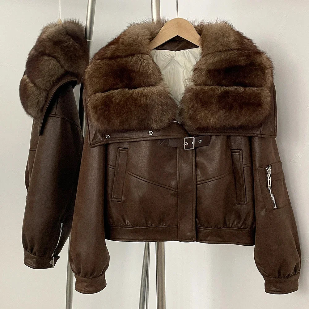 Brown leather jacket with fur collar on a hanger against a white background