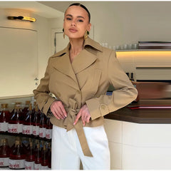 Belted mock neck cropped jacket with button details and cuff straps