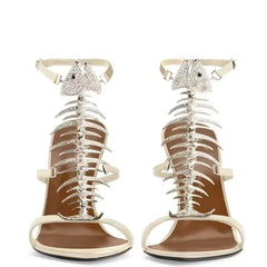 White leather crystal fishbone stiletto sandals