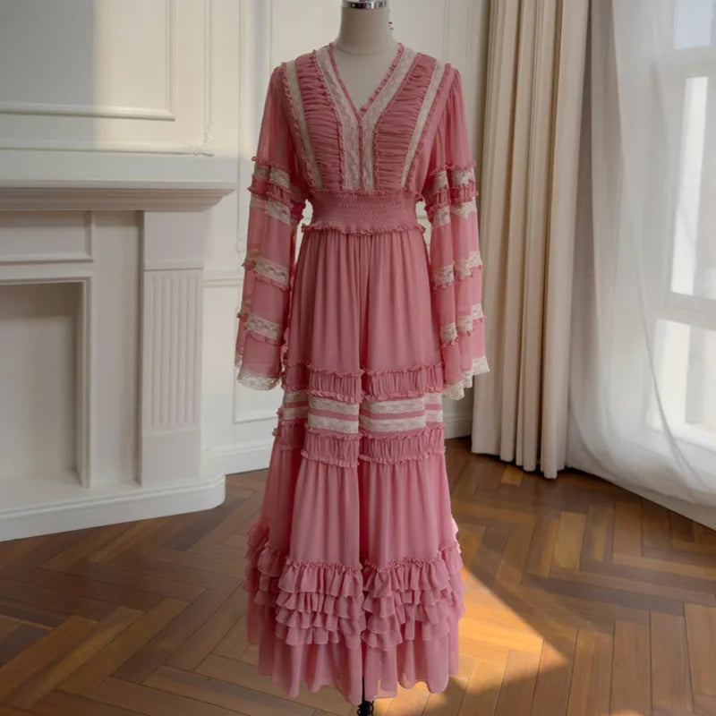 Ruffled V-Neck Chiffon Maxi Dress displayed in a room