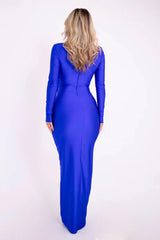 Woman wearing a long blue dress on a white background