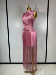 Side view of pink fringe turtleneck dress