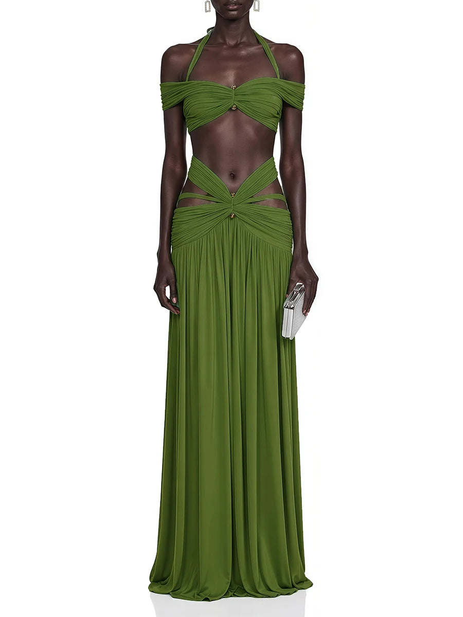 Full length view of a green halter neck ruched crop top and cutout midi skirt set