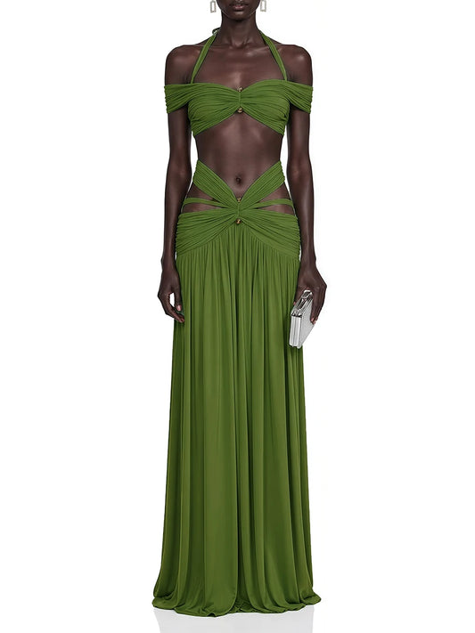 Full length view of a green halter neck ruched crop top and cutout midi skirt set