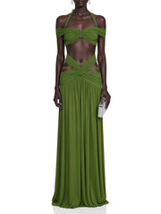 Full length view of a green halter neck ruched crop top and cutout midi skirt set