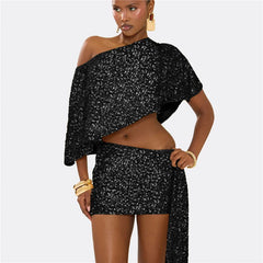 Woman wearing a black sequin outfit on a white background