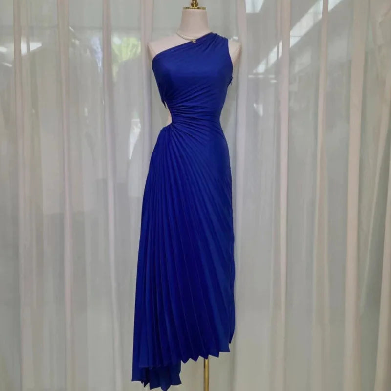 Royal blue asymmetrical one-shoulder gown on a mannequin.