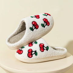 Two white plush cherry slippers stacked