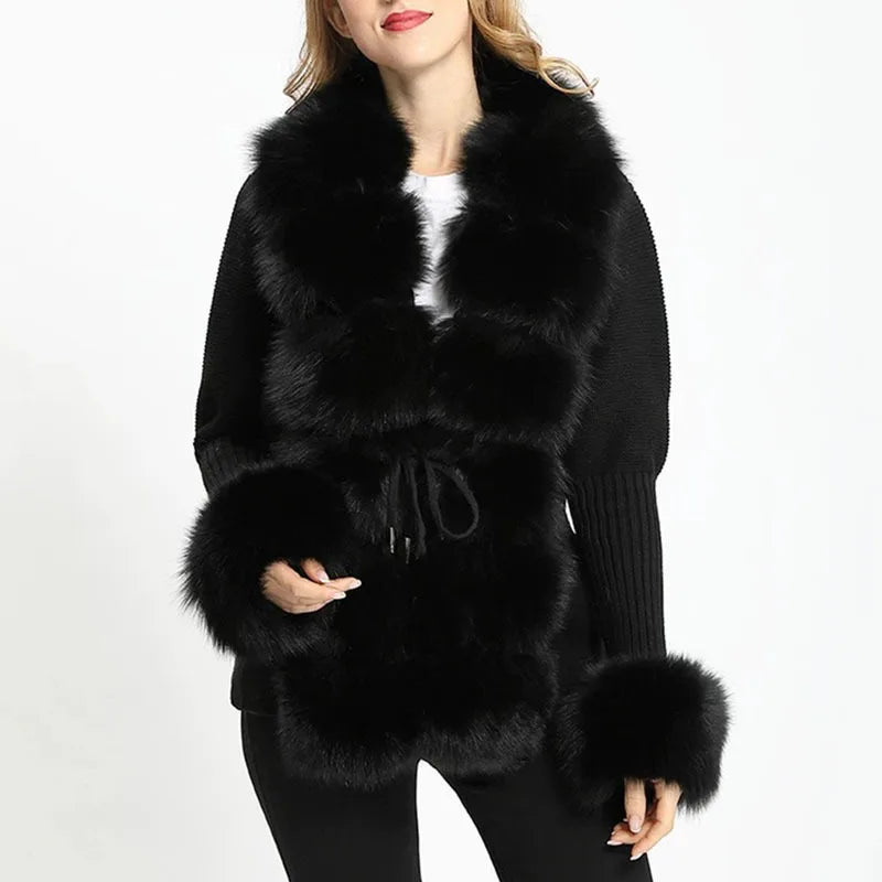 Black fur-studded garment worn by a model 