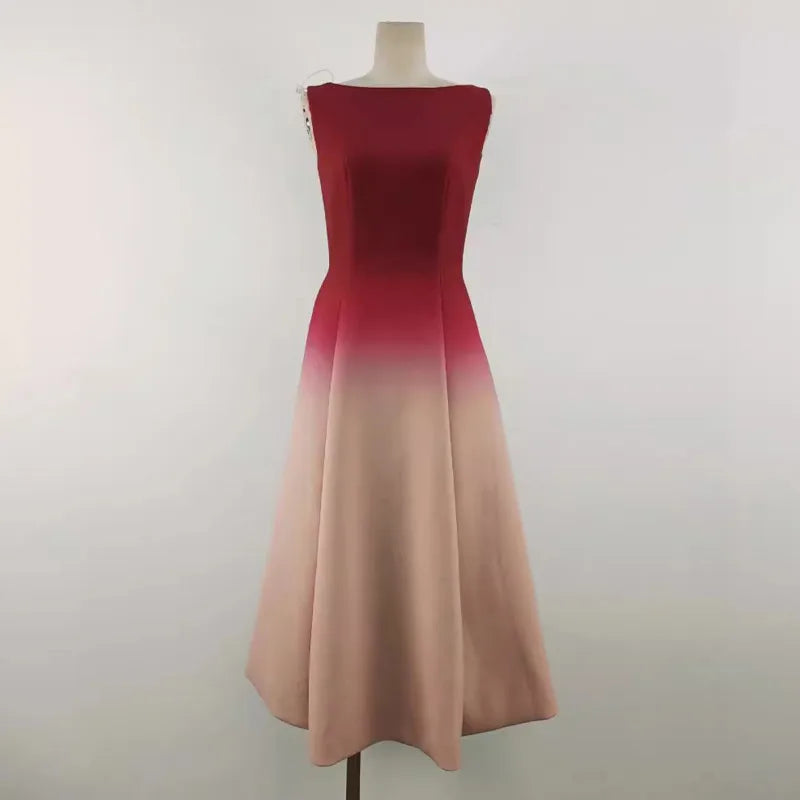 Ombre dress transitioning from red to beige on a mannequin against a white background