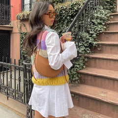  Woman wearing a Rainbow Striped Knitted Sleeveless Sweater