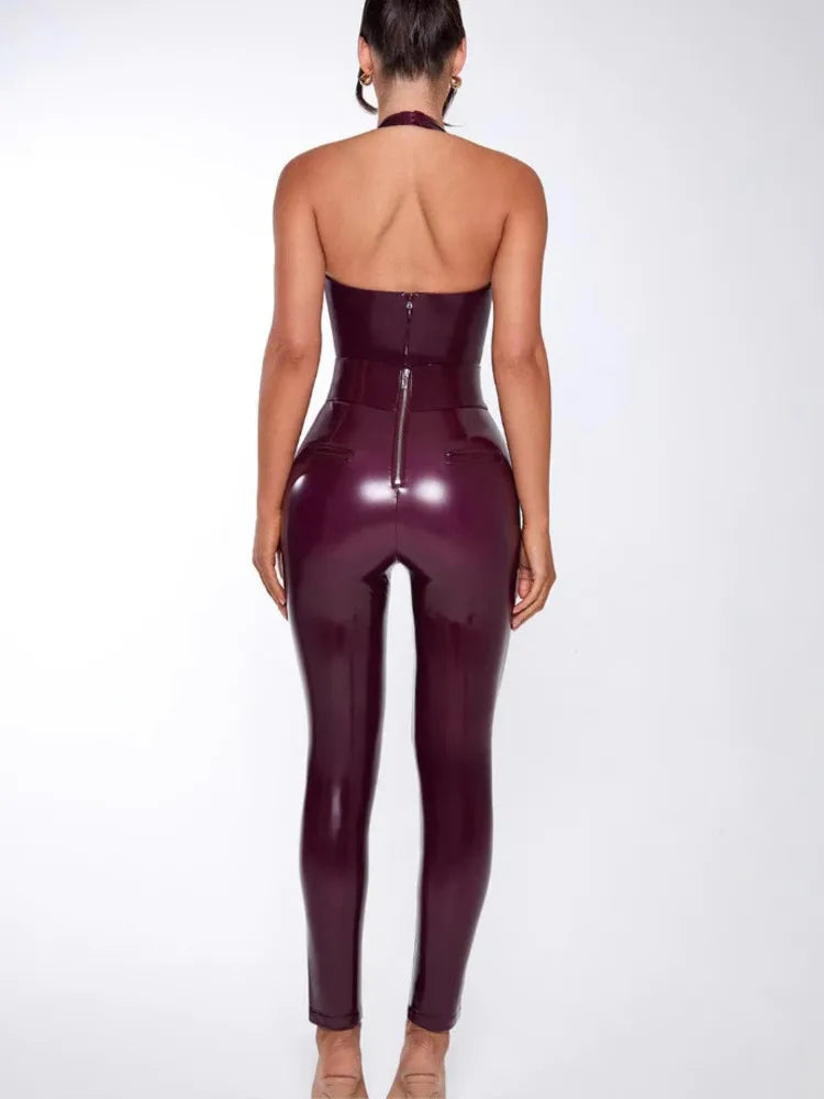 Person wearing a shiny purple jumpsuit