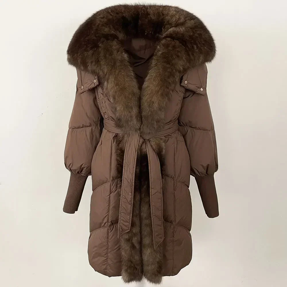 Brown puffer coat with fur trim on a white background