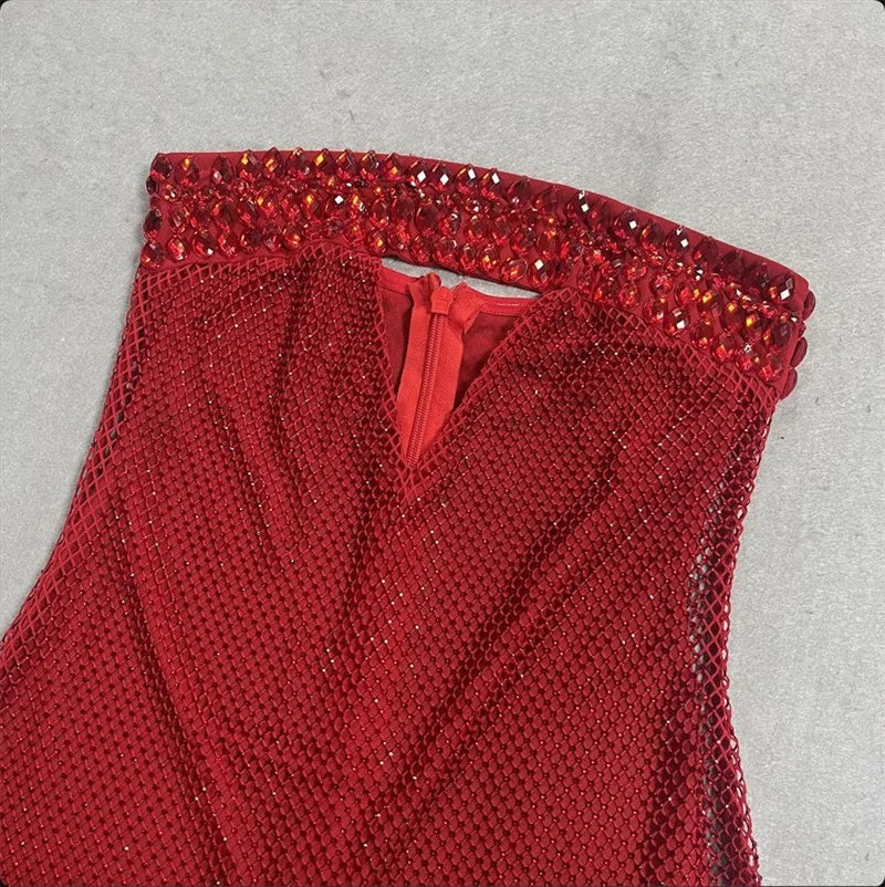 Close-up of the strapless neckline and zipper detail on the crystal gown