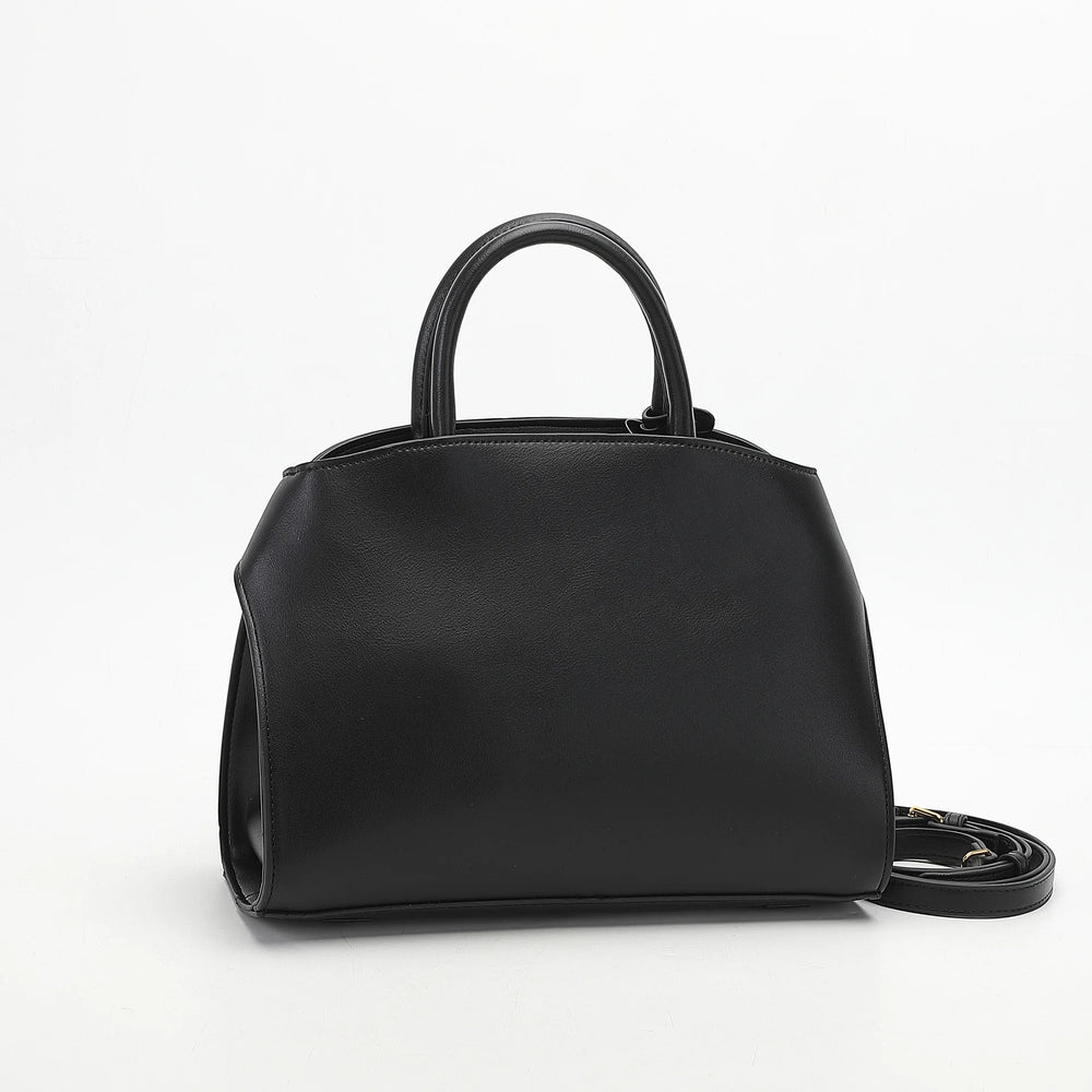 Back view of a black structured top-handle bag.