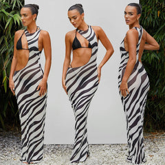 Model wearing zebra print beach cover-up