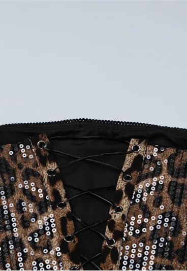 Leopard print sequin top on a light gray background