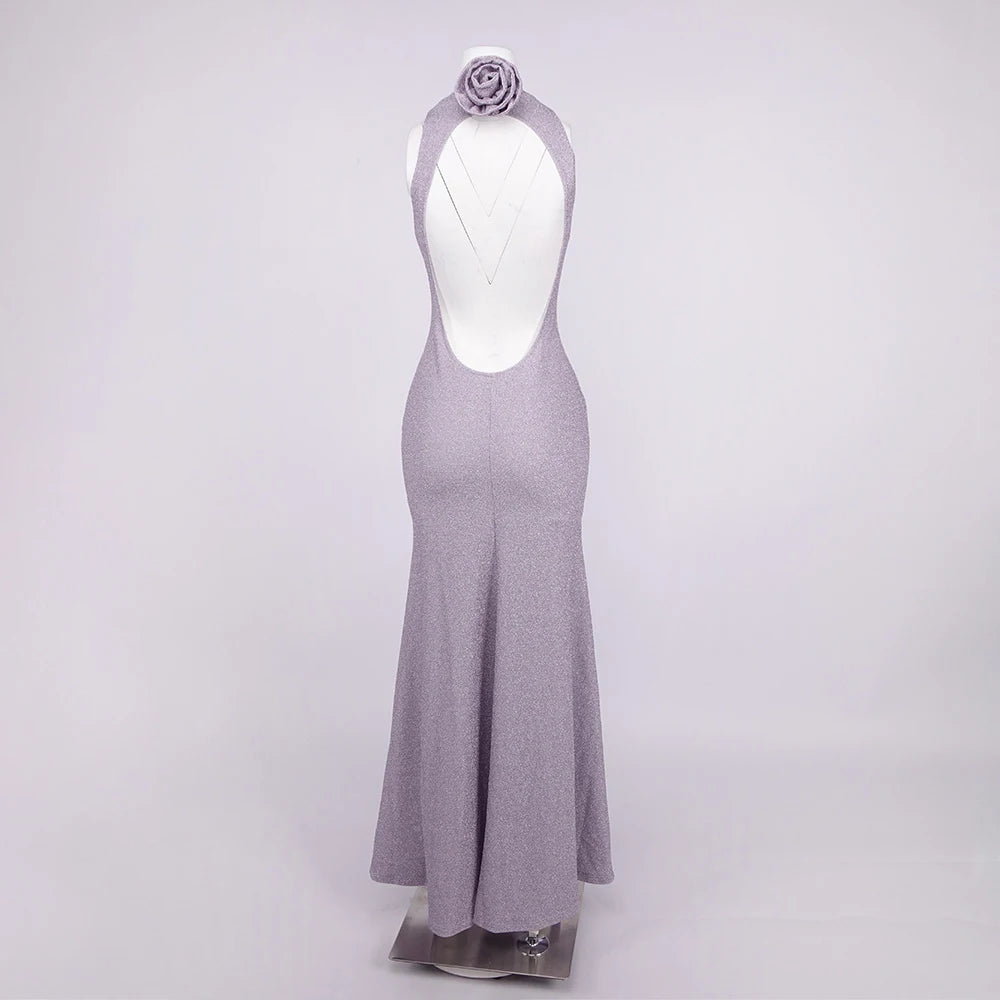 Gray halter neck dress with a floral headband on a white background