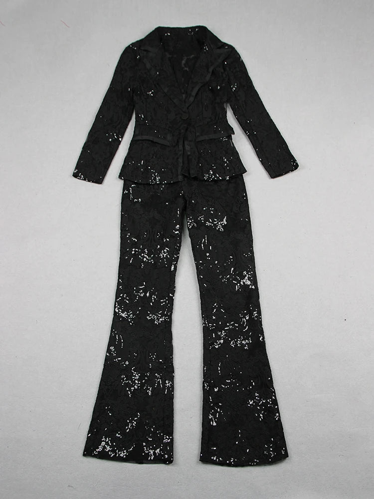 Flat lay of the black sequin embroidered lace blazer and flare pants set.