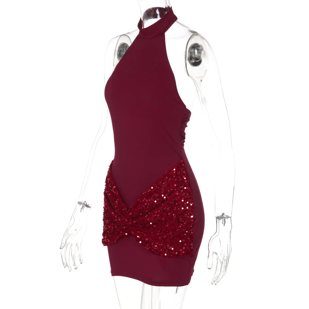 Red dress with sequin detail on a mannequin against a white background