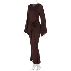 Brown dress with cape-like sleeves on a white background