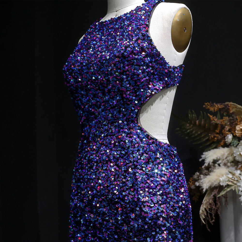 Mannequin wearing a blue sequin dress against a dark background