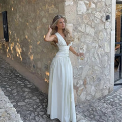 White deep V-neck ruched waist maxi dress with flowing skirt