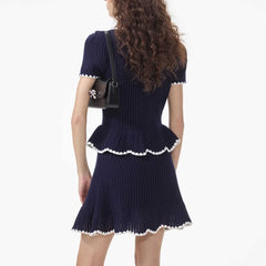 Navy V-neck mini dress with hollow out details.