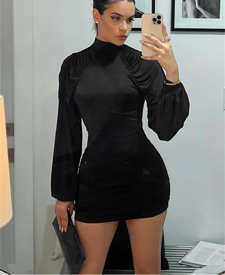 Black ruched mock neck long sleeve mini dress with clutch