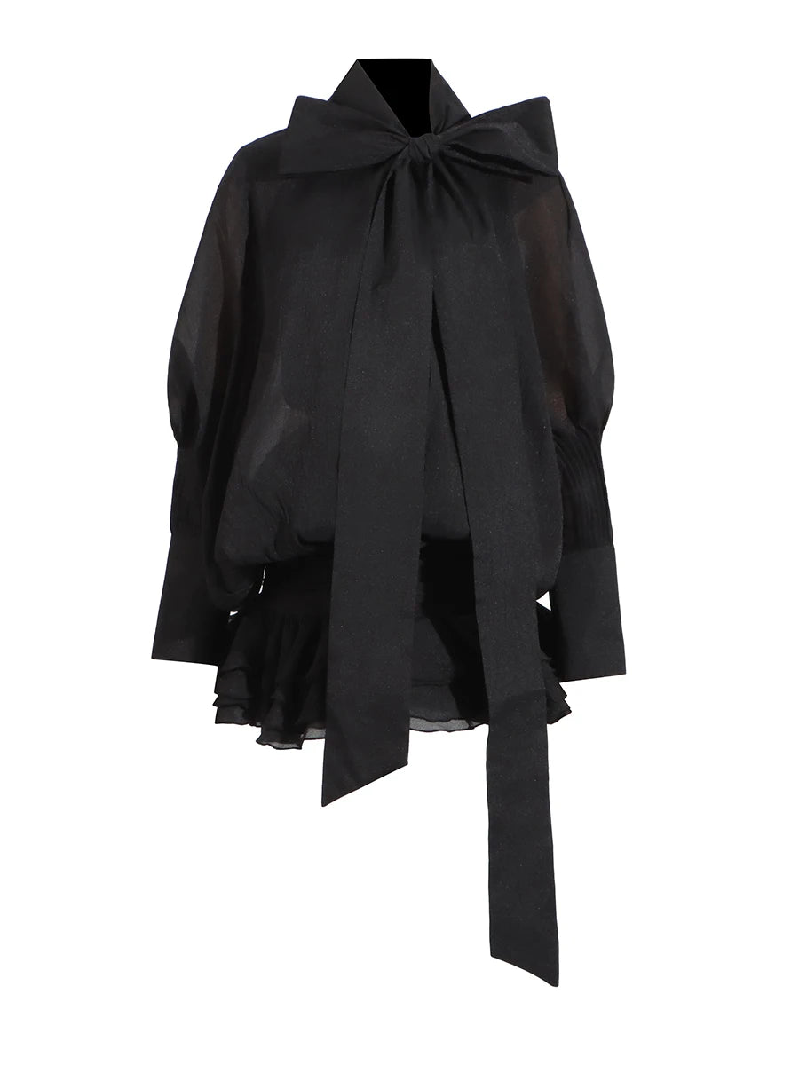 Black blouse with a large bow 