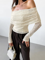 Women’s knit sweater backless pullover with patchwork and off-shoulder design.