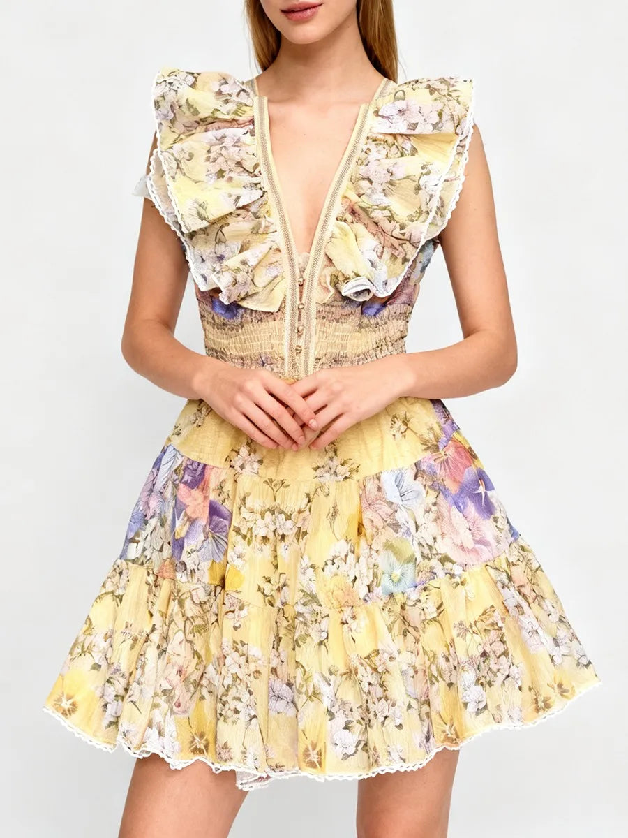 Ruffled V-neck sleeveless tiered mini dress with hands clasped