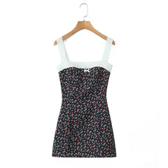 Women's mini dress with floral embroidery and a lace neckline.